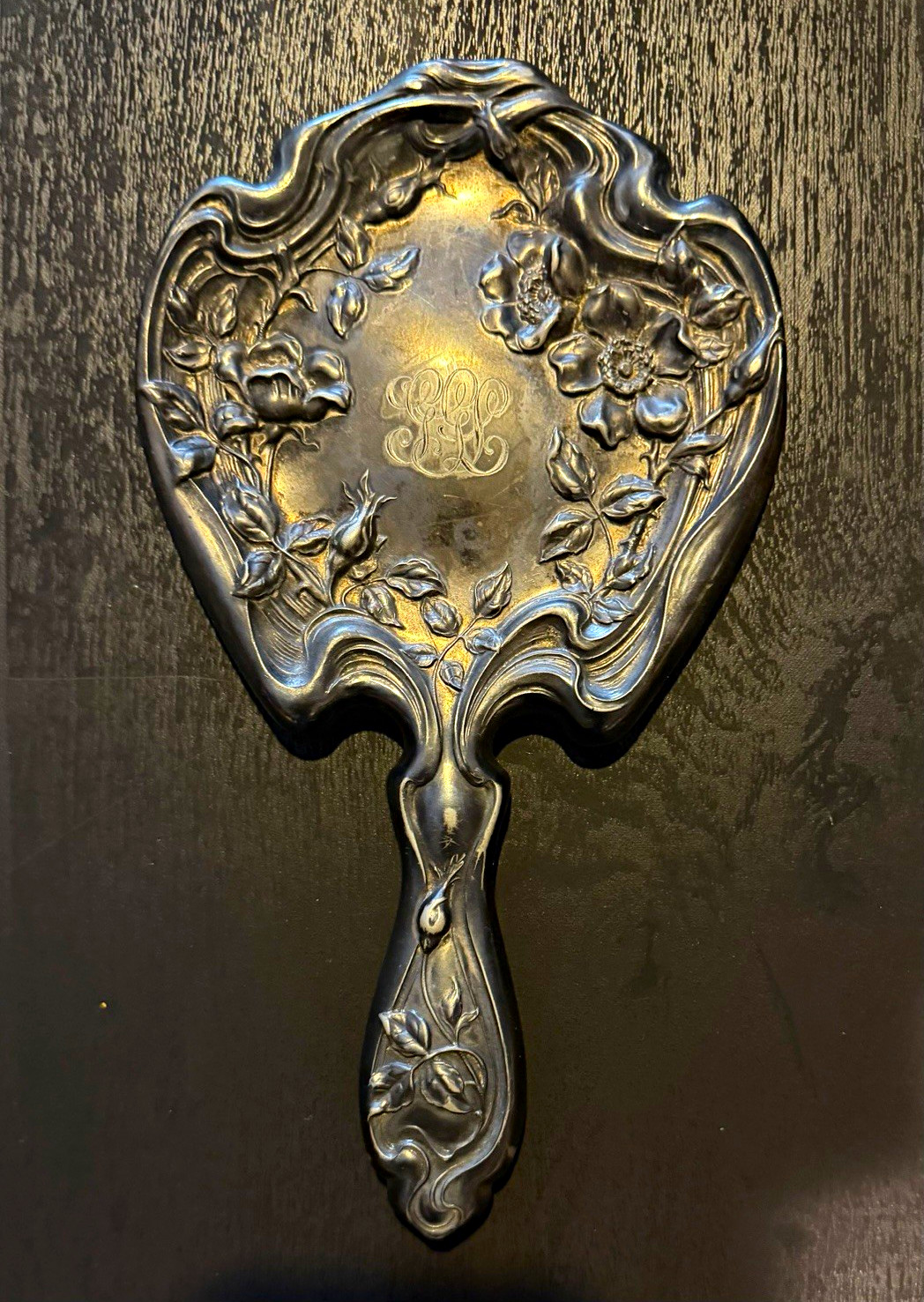 Vintage Ornate Floral Metal Hand mirror.